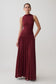 Woman wearing a dark red high neck modal maxi dress.