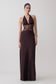 Woman wearing a brown lace and satin maxi dress.