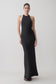 Woman wearing a black satin halter maxi dress.
