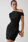 Woman wearing a black off-shoulder mini dress.
