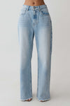 Light blue straight leg jeans with frayed hem.