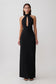 Woman wearing black stretch crepe maxi dress.