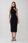 Woman wearing a black one shoulder tie midi dress.