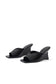 A pair of black leather wedge mule sandals with a square toe, displayed on a clean white background.