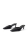 A pair of black pointed-toe mule heels with slim kitten heels, shown from a three-quarters angle on a clean white background.