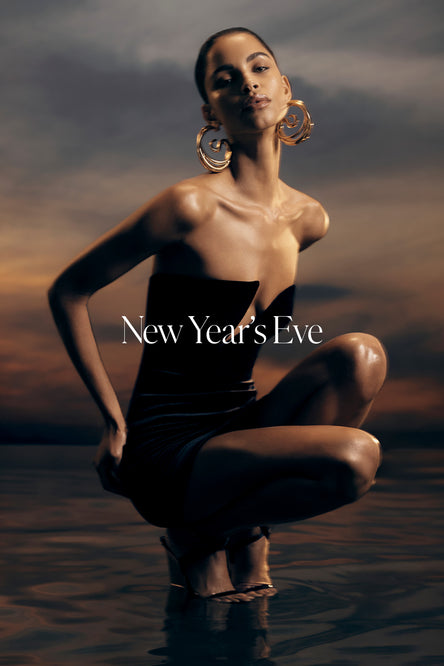 Woman in a black mini dress.