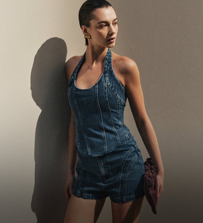 Woman in denim set.