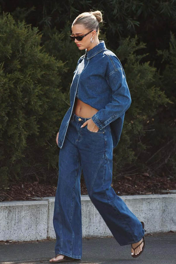 Image of sophadophaa_ wearing a dark blue denim set