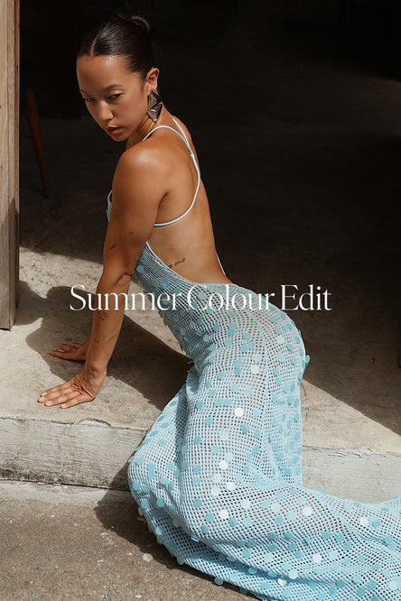 Woman in a light blue sequin dress with 'Summer Colour Edit' text.