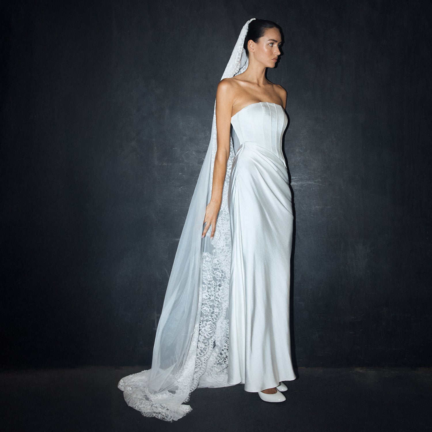 woman wearing bridal dress and veil